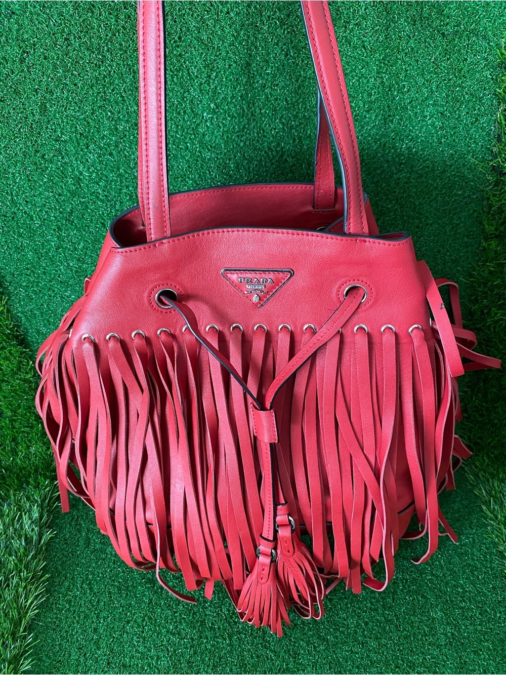 Prada Fringed leather Red Bag , 2014 / 11”x11”
(Jul 026)
